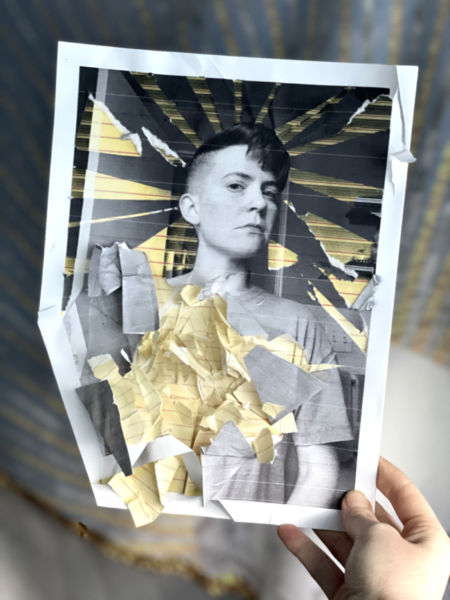 Handcut collage portrait of Lyss, a white, non-binary person with red hair that is shaved to a skin fade on the sides and several inches long on top. The collage features a black and white portrait of Lyss, with ripped yellow lined paper bursting forth from their chest.